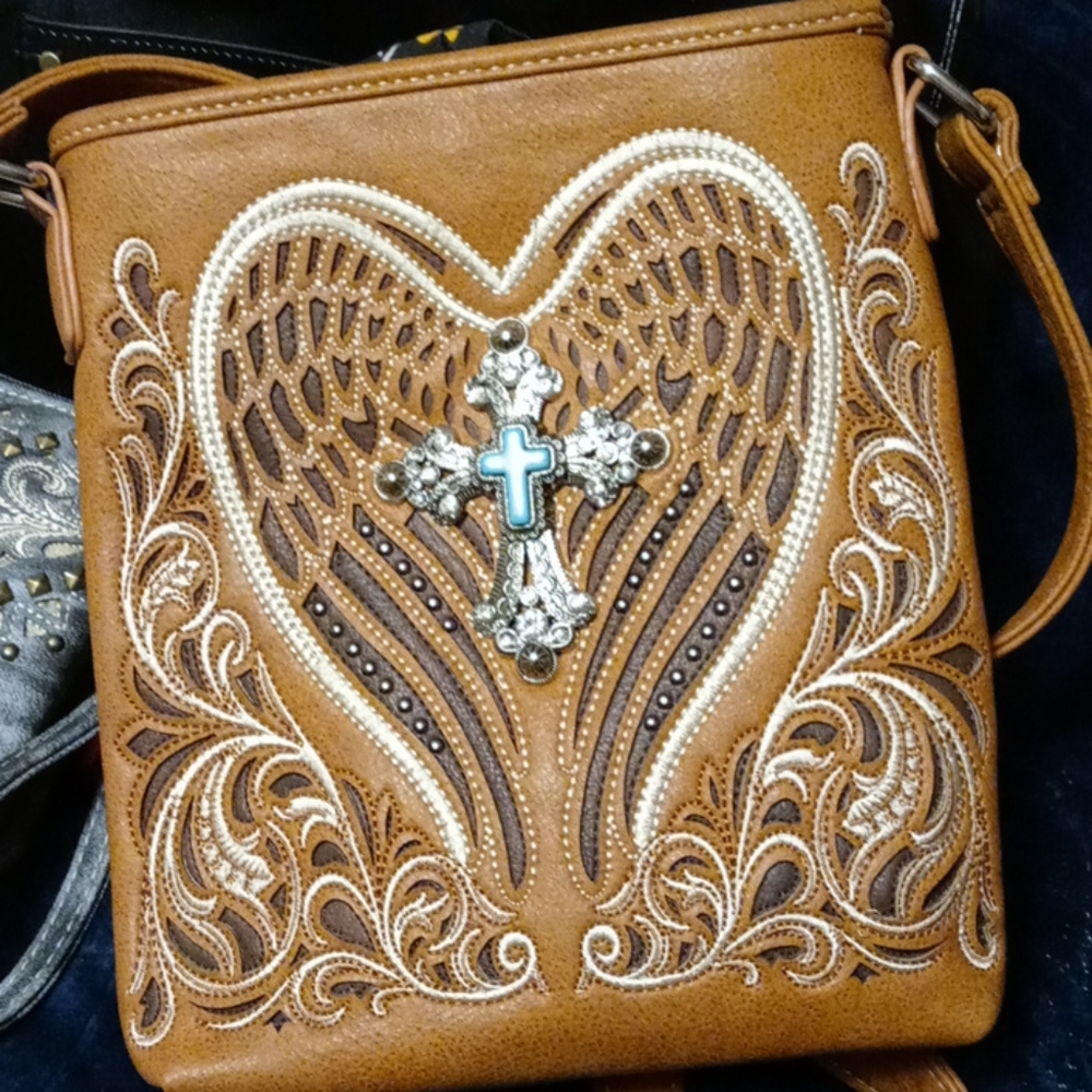 Brand new handbag hand beaded the cross
